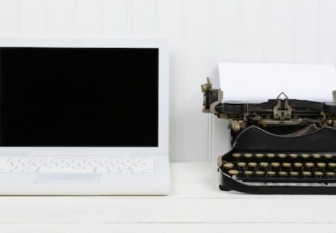 Laptop and typewriter