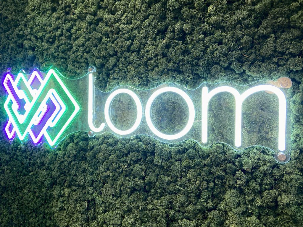 Loom sign on wall in new office