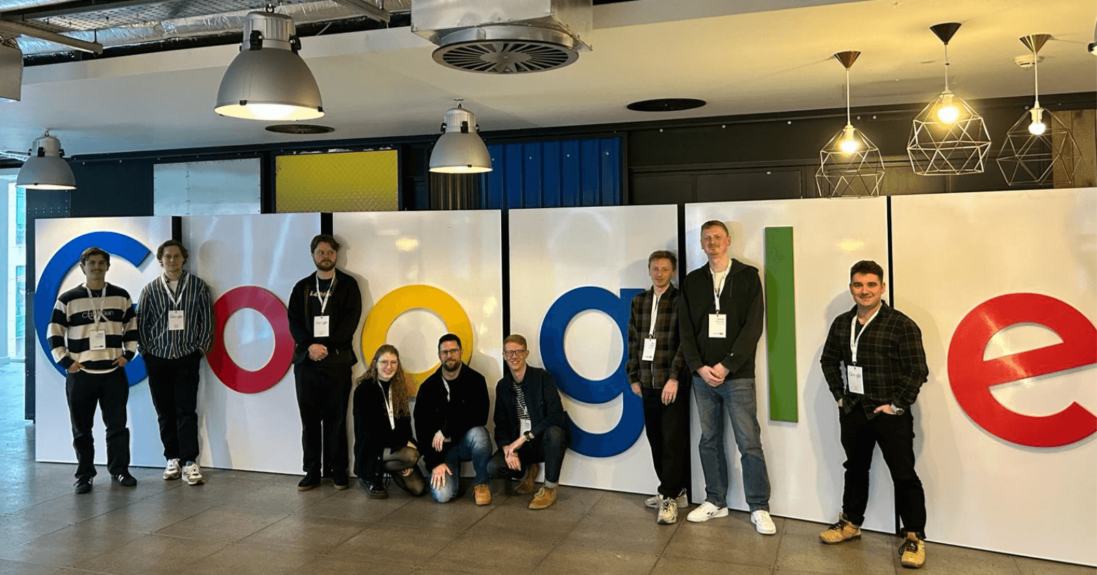 PPC team in front of the Google logo