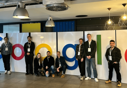 PPC team in front of the Google logo
